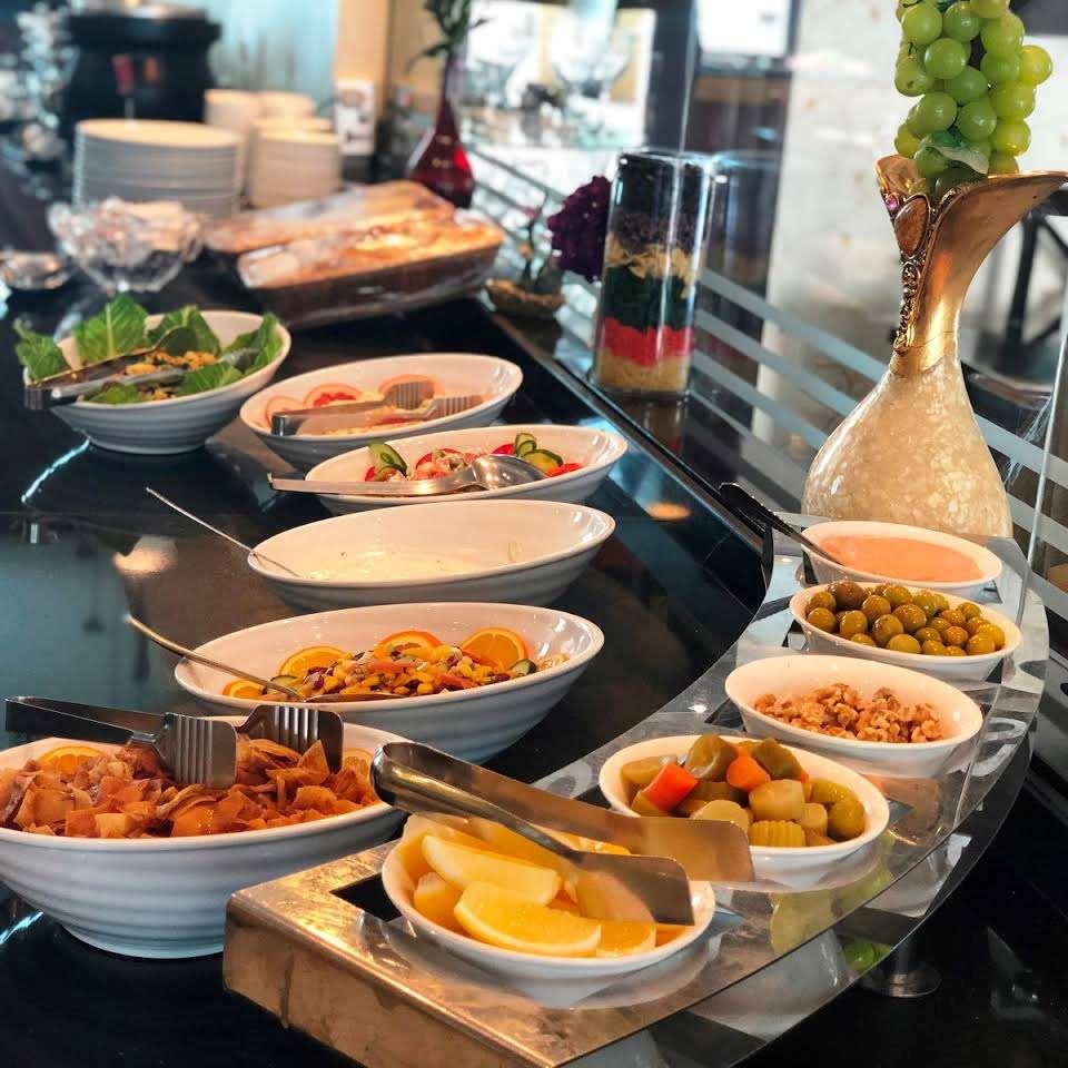 דובאי Al Jawhara Hotel Apartments מסעדה תמונה